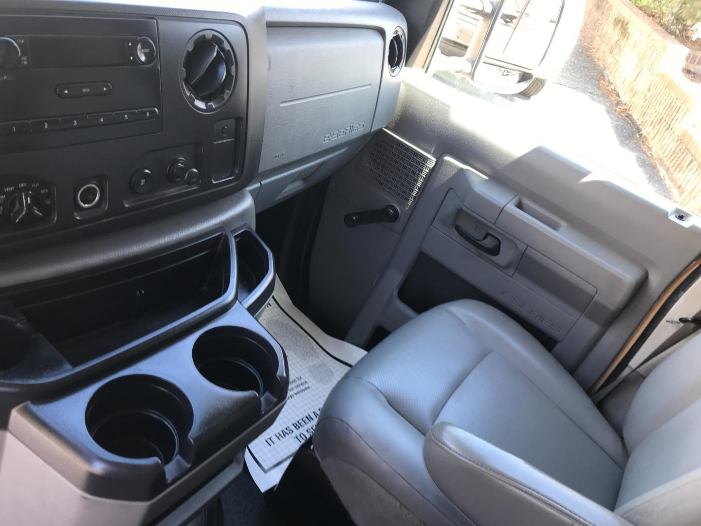 2011 Tan /Gray Ford E-Series Van E250 (1FTNE2EW5BD) with an 4.8 V8 engine, Automatic transmission, located at 577 Chester Pike, Prospect Park, PA, 19076, (610) 237-1015, 39.886154, -75.302338 - 2011 Ford E250 Cargo Van: Ladder racks, shelving, heavy duty partition, power inverter, fully metal body, FLEET MAINTAINED, runs LIKE NEW! This vehicle comes inspected and has been given a bumper to bumper safety check. It is very clean, reliable, and well maintained. We offer a unique pay plan t - Photo#14